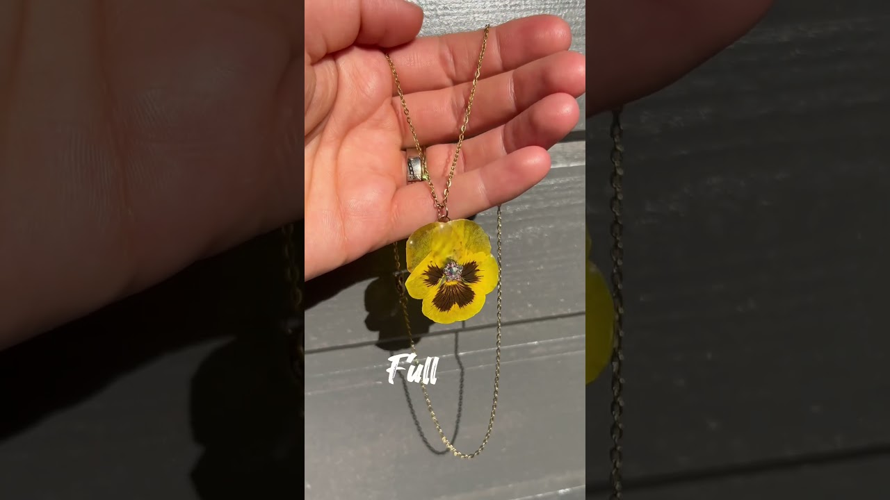 Ann+Joy real flower resin necklace — yellow pansy flower petals preserved in clear epoxy resin pendant on gold chain
