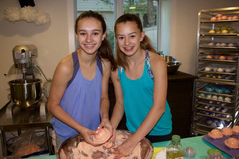 The Bercaw sisters handcrafting bath bombs in their studio