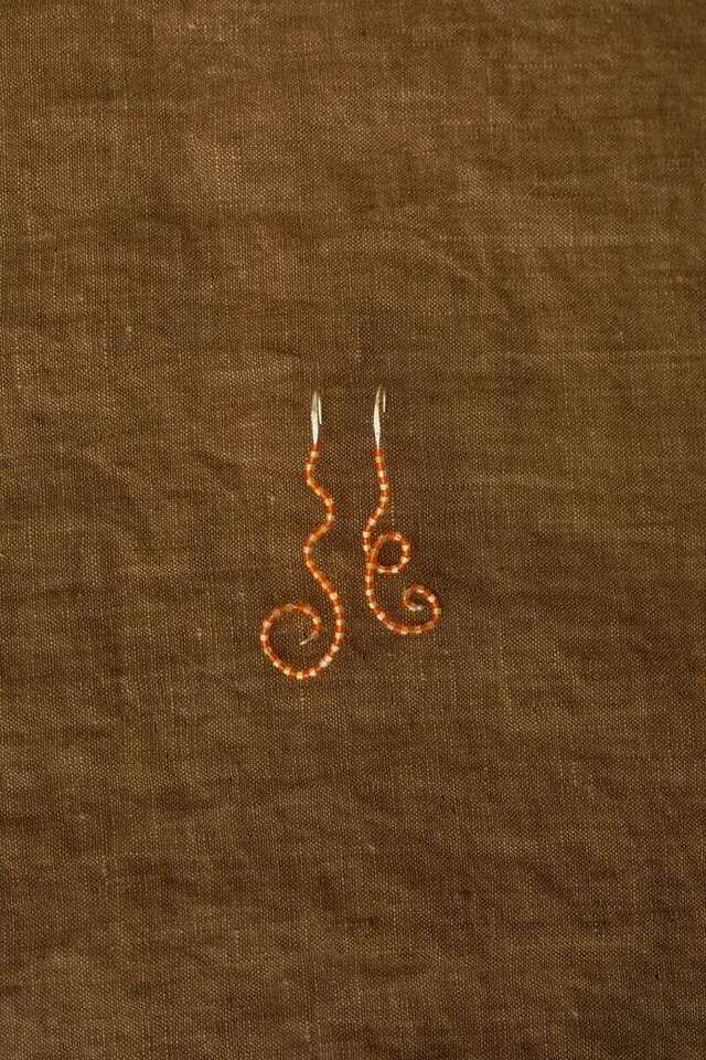 Rubinski Works beaded earrings close-up — fine glass beads and precious metal components