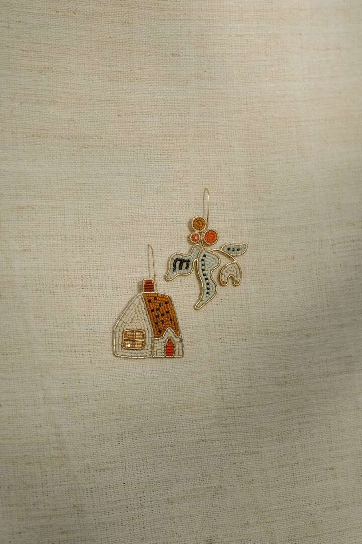 Rubinski Works beaded earrings — house and bird motifs in dense beadwork